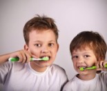 Children brushing teeth