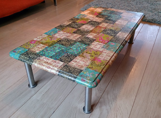 coffee table covered with scrapbook paper