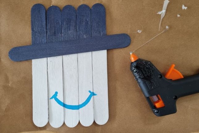 Snowman Ice Block Stick Craft-painted smile