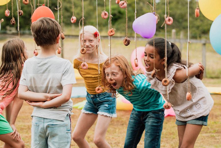 15 Fun Party Games for 8 to 12 year olds-Doughnuts on strings