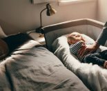 mom checking on bay sleeping because he is not eating too well