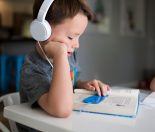 Kid listening to an audiobook